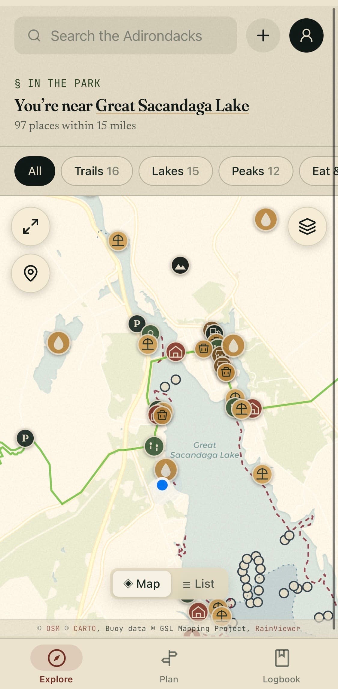 The app's Explore tab: a live map near Great Sacandaga Lake showing 97 places within 15 miles — trails, lakes, peaks, beaches, campsites, and parking — with filter chips and a map/list toggle.
