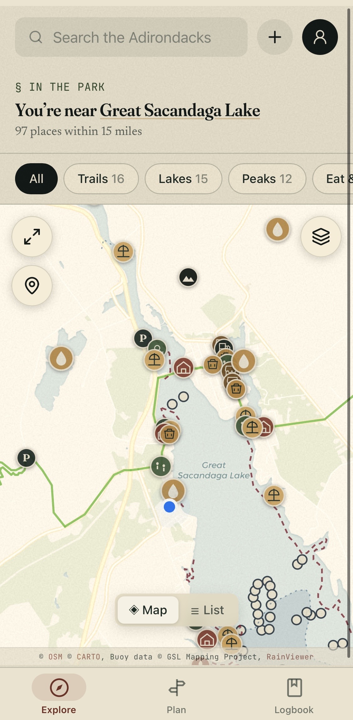 The app's Explore tab: a live map near Great Sacandaga Lake showing 97 places within 15 miles — trails, lakes, peaks, beaches, campsites, and parking — with filter chips and a map/list toggle.