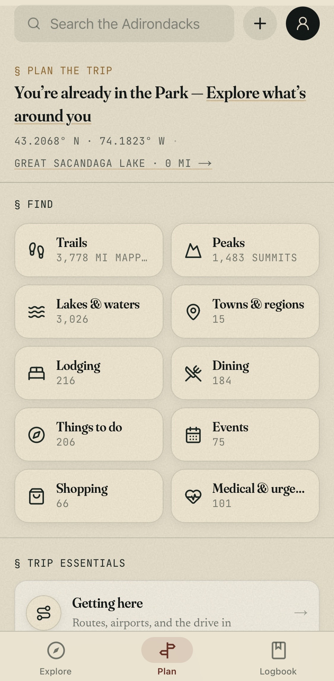 The app's Plan tab: a trip-planning hub with cards for trails, peaks, lakes, towns, lodging, dining, things to do, events, shopping, and medical — plus a Getting Here guide.