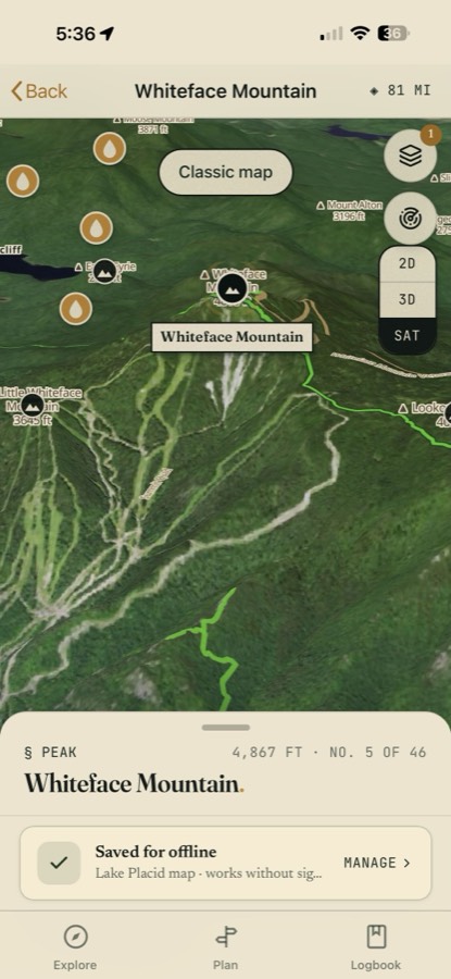 Whiteface Mountain in the app's 3D satellite view: the peak pin at 4,867 feet, No. 5 of 46, ski trails carved down the face, nearby peaks labeled, 2D/3D/SAT toggles, and a Saved-for-offline card for the Lake Placid map.